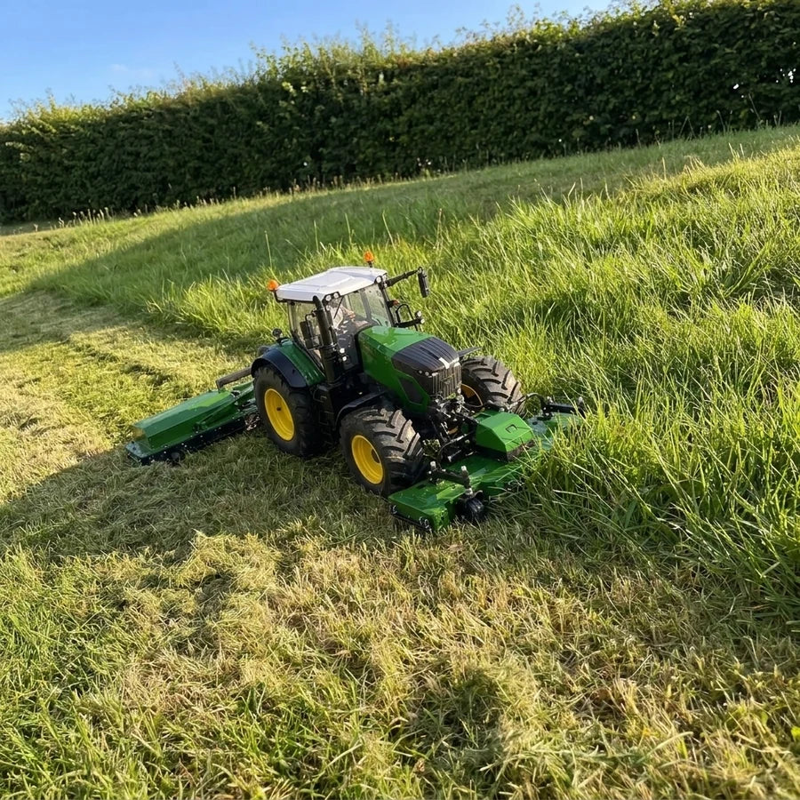 Remote control mower cutting a grass bank